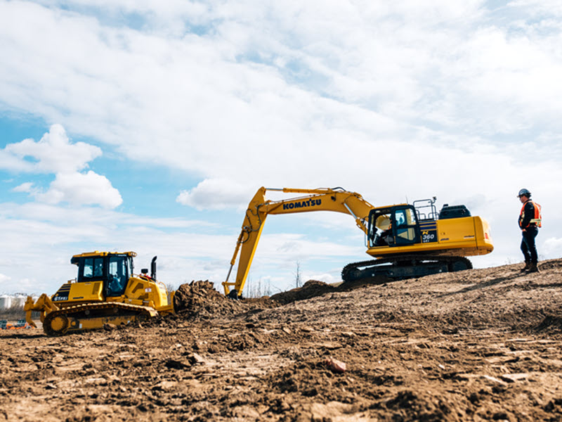 What role do SMS Equipment and Komatsu Finance play in equipment financing? 